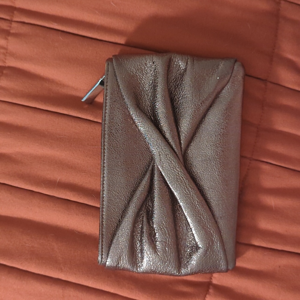 Metallic silver reiss clutch